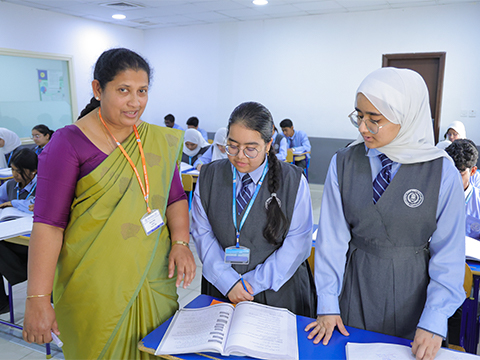 Classroom lesson showing Kuwait middle school curriculum in action.
